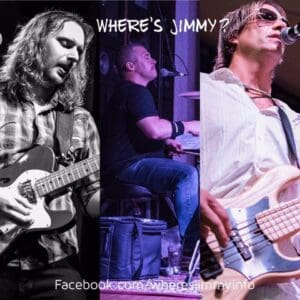 Three musicians performing on stage with intense focus and energy.